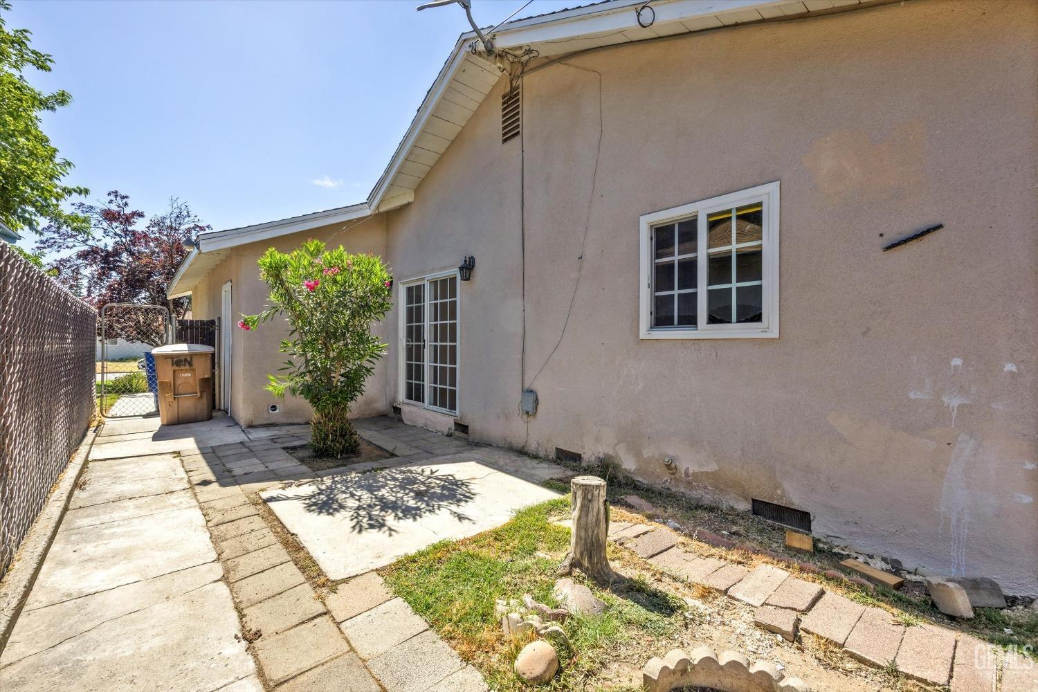 Undisclosed Address Bakersfield, CA 93309 - Photo 23 of 32 a front view of a house