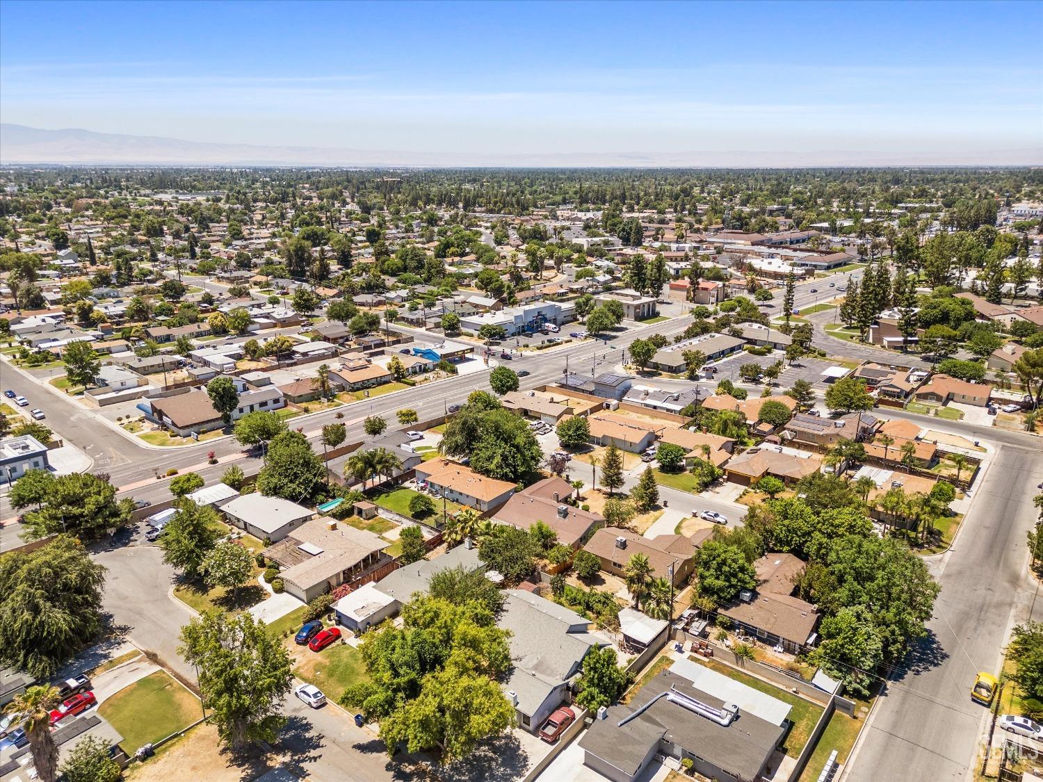 Undisclosed Address Bakersfield, CA 93309 - Photo 30 of 32 an aerial view of residential building with parking space