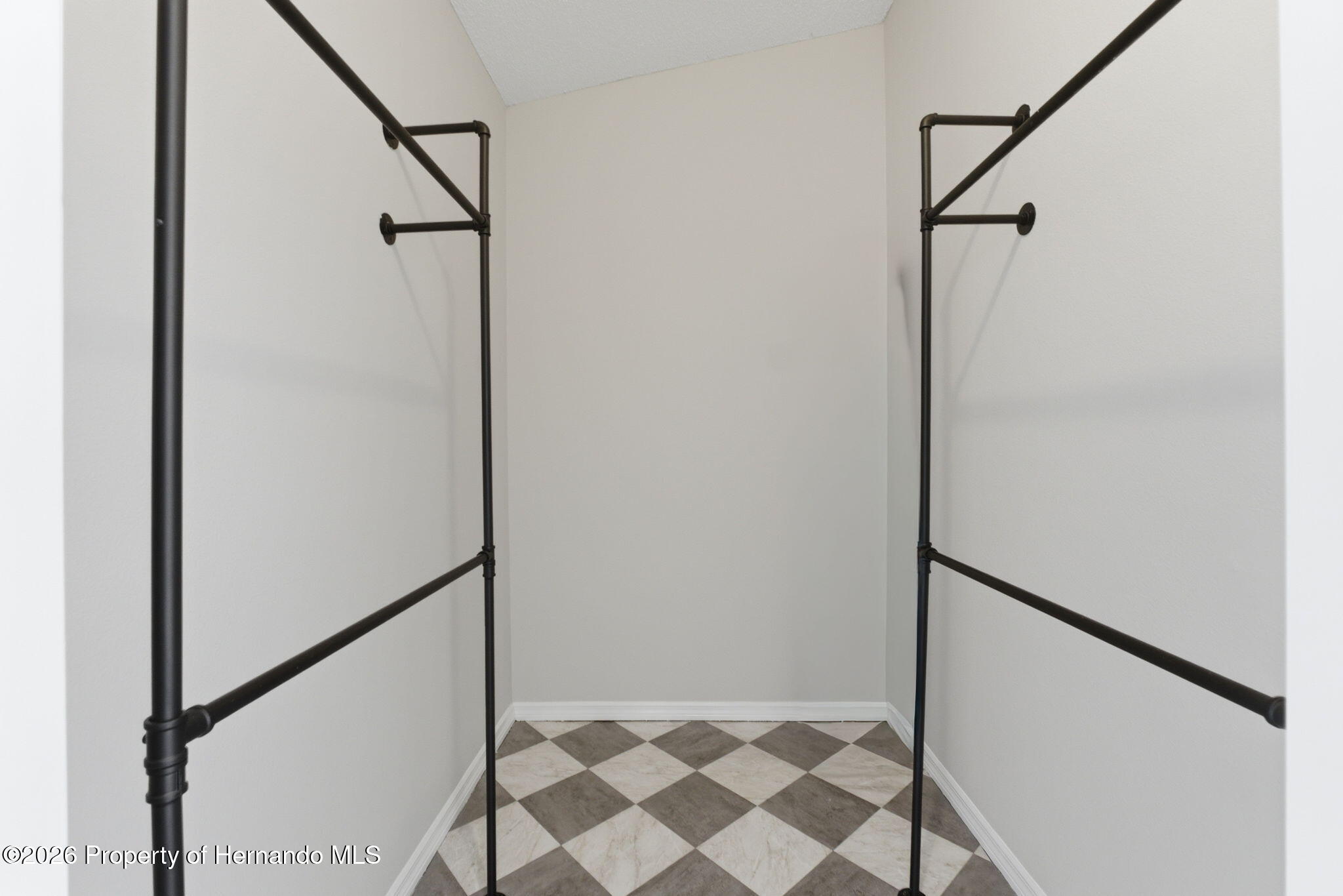 4966 Keysville Avenue Spring Hill, FL 34608 - Photo 27 of 50 a bathroom with a shower and a glass door
