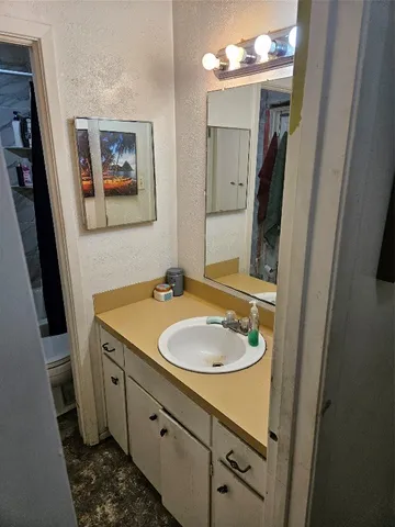 a room with furniture and a flat screen tv