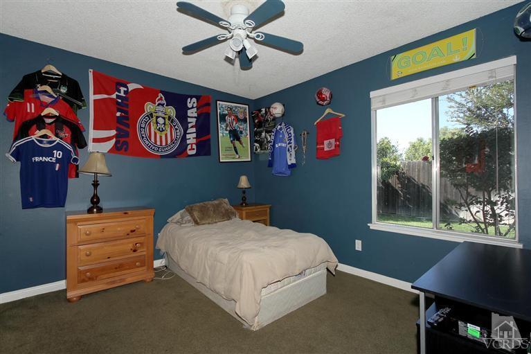 4757 Avedon Road Moorpark, CA 93021 - Photo 12 of 22 a bed room with a bed and a window