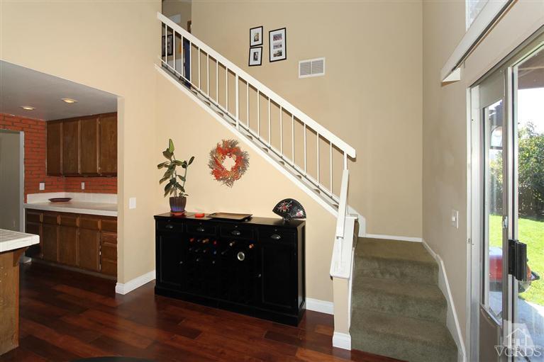 4757 Avedon Road Moorpark, CA 93021 - Photo 21 of 22 a view of entryway and kitchen with wooden floor