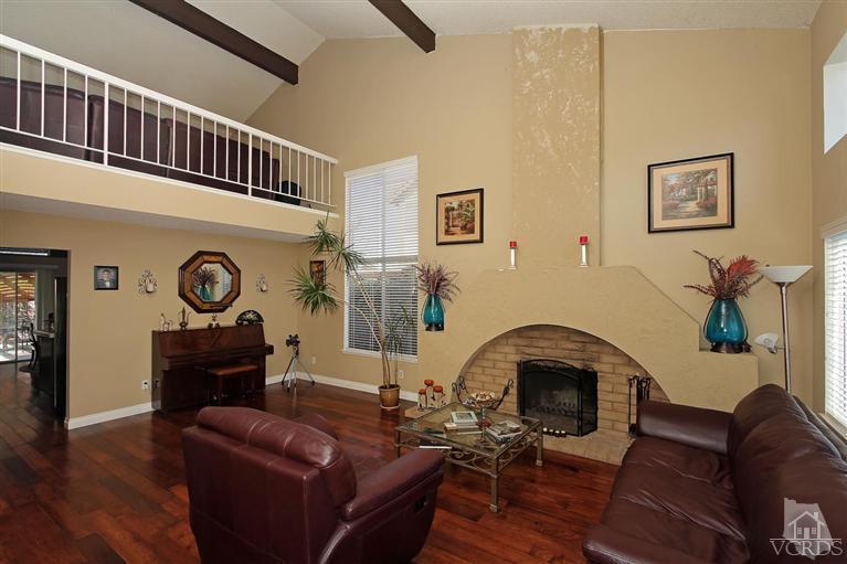 4757 Avedon Road Moorpark, CA 93021 - Photo 4 of 22 a living room with furniture and a wooden floor