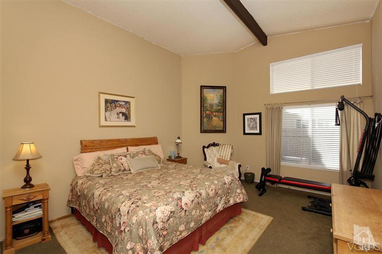 4757 Avedon Road Moorpark, CA 93021 - Photo 8 of 22 a bed room with a bed and a couch