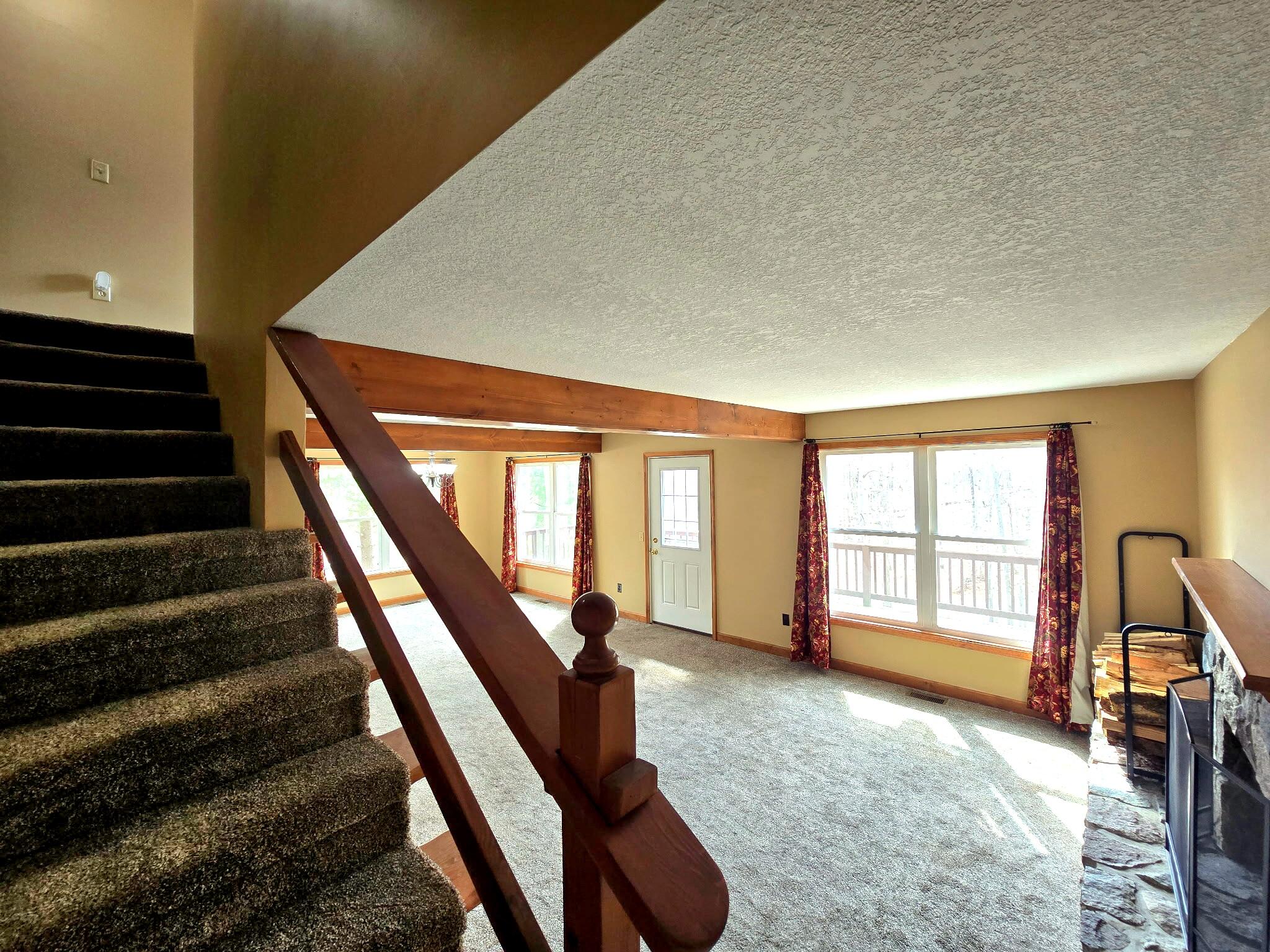 814 Timber Valley Road Gaylord, MI 49735 - Photo 25 of 60 Living Room Stairway