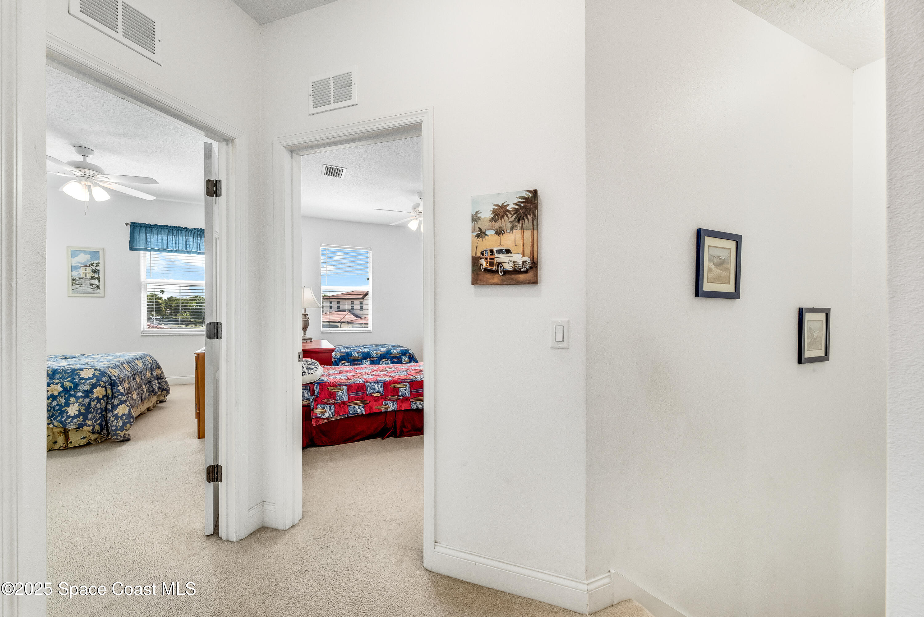 3188 Ricks Way, Unit B Melbourne Beach, FL 32951 - Photo 19 of 58 a room with furniture and mirror