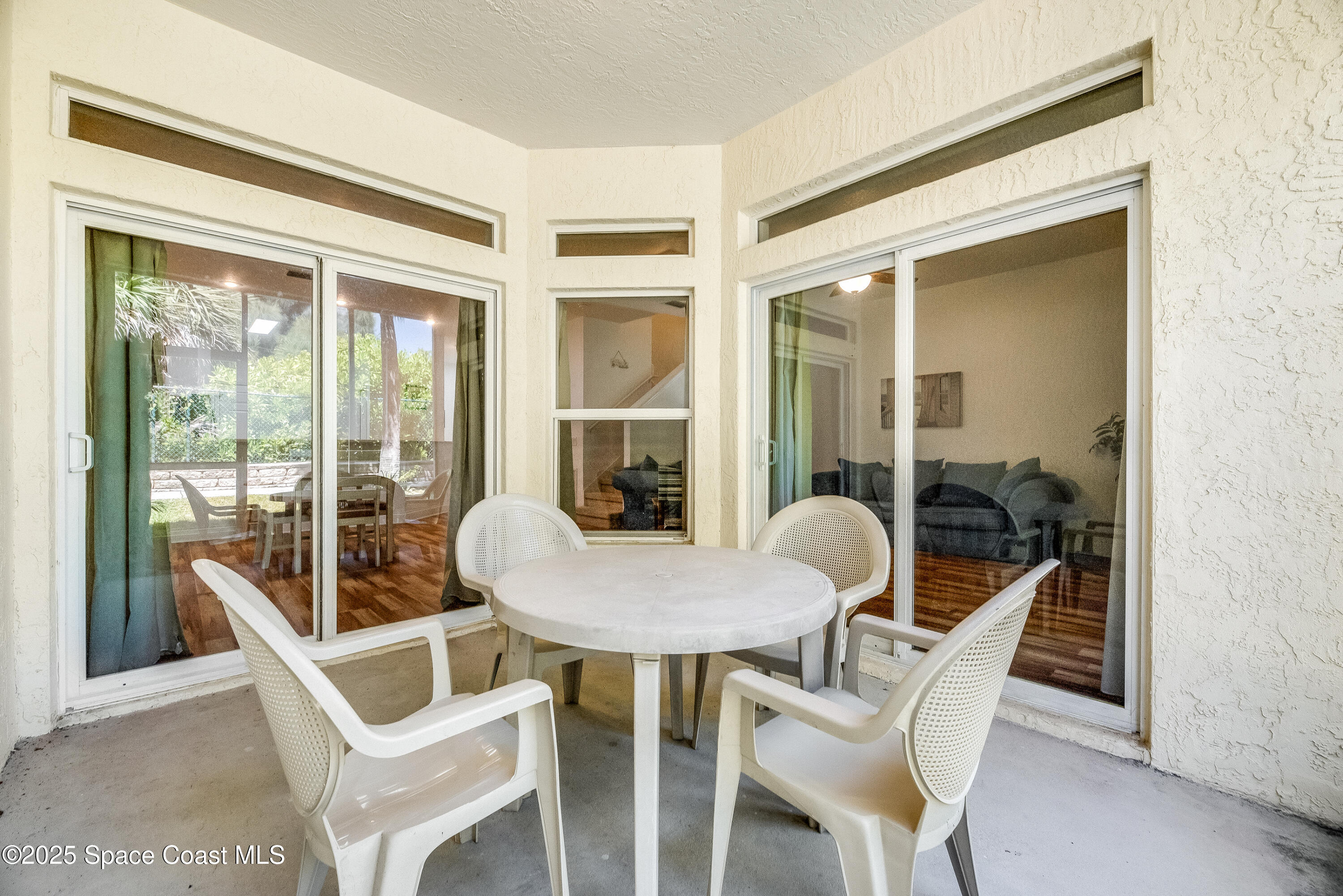 3188 Ricks Way, Unit B Melbourne Beach, FL 32951 - Photo 32 of 58 a dining room with furniture and window
