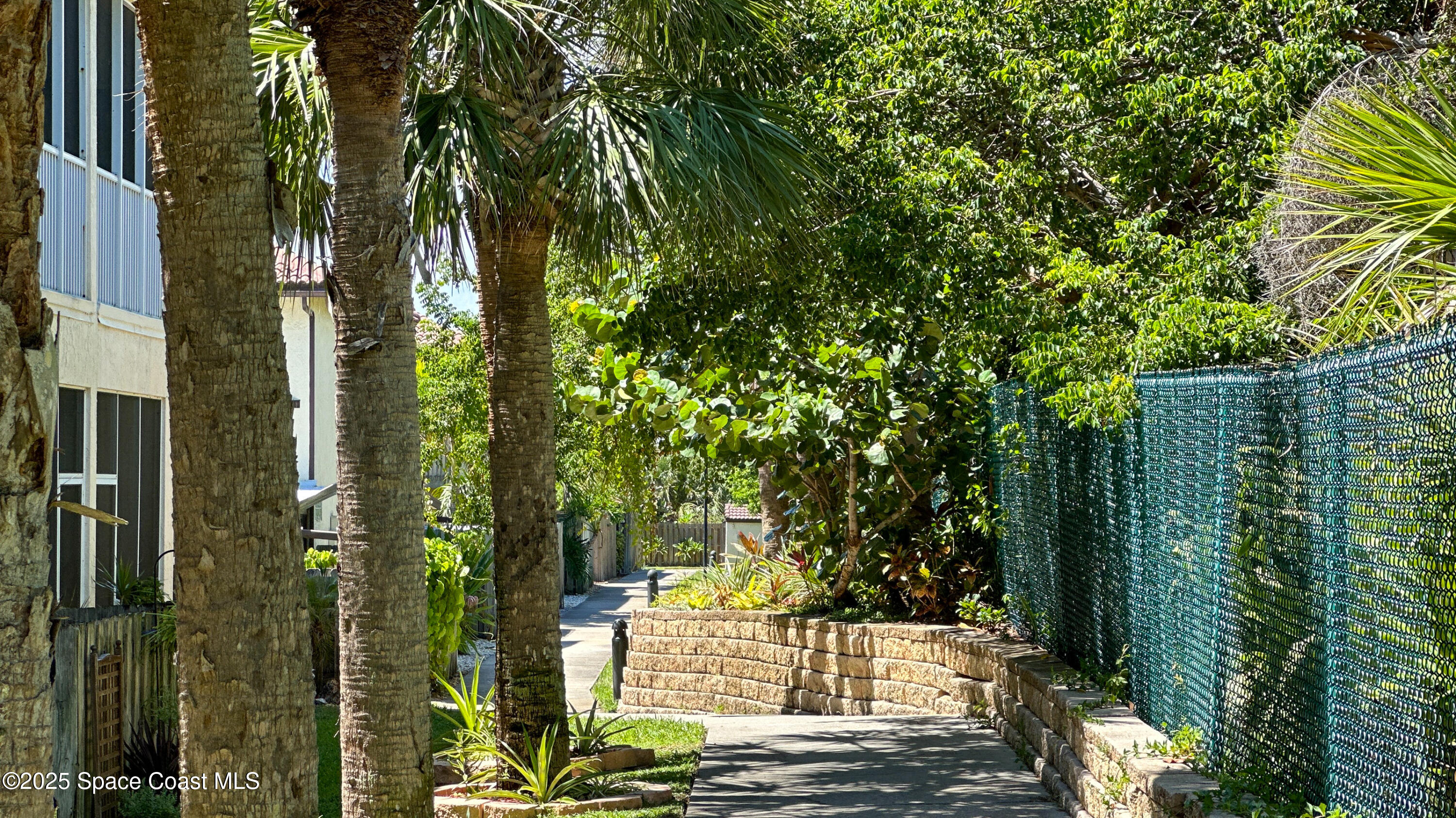 3188 Ricks Way, Unit B Melbourne Beach, FL 32951 - Photo 39 of 58 a view of balcony with yard