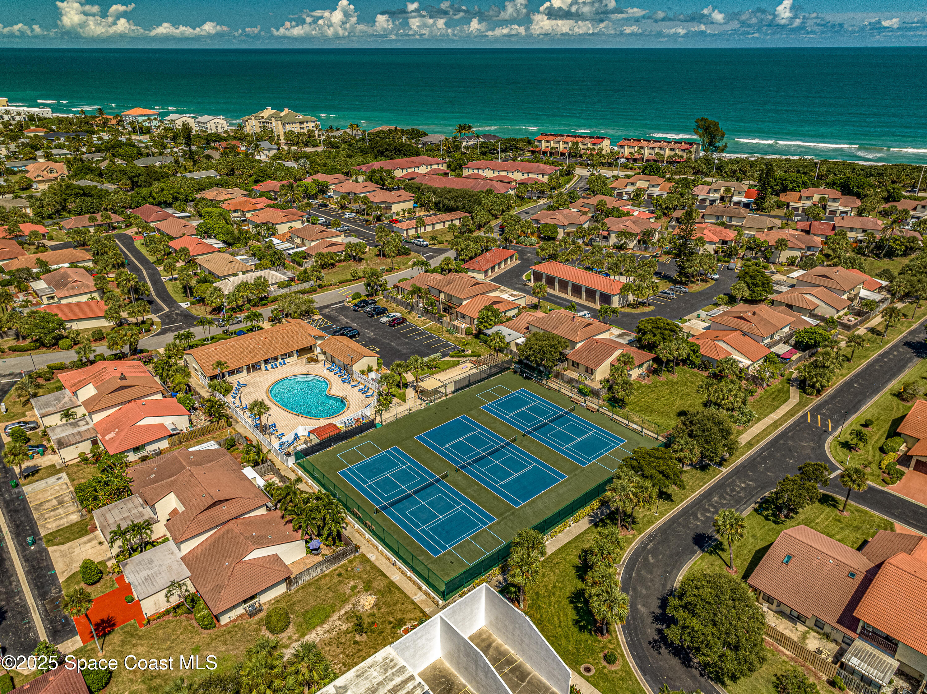 3188 Ricks Way, Unit B Melbourne Beach, FL 32951 - Photo 46 of 58 an aerial view of a residential houses with outdoor space and ocean view
