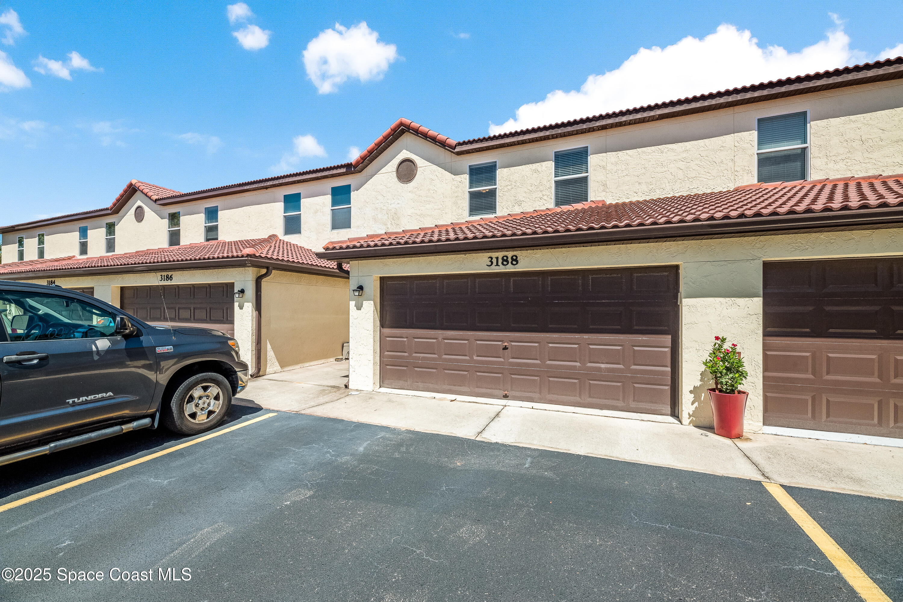 3188 Ricks Way, Unit B Melbourne Beach, FL 32951 - Photo 48 of 58 a car parked in front of a house