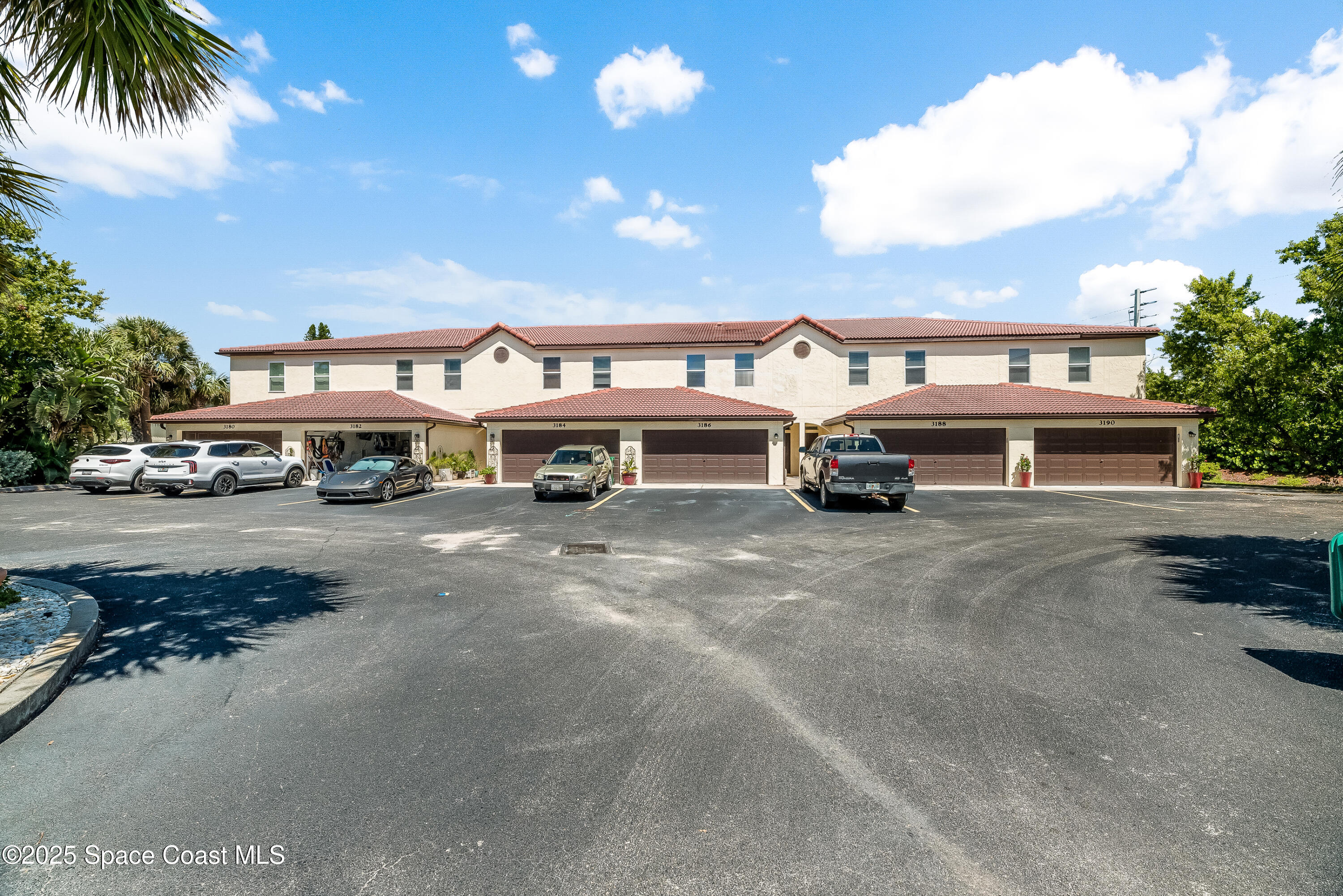 3188 Ricks Way, Unit B Melbourne Beach, FL 32951 - Photo 49 of 58 a bus parked in front of a building