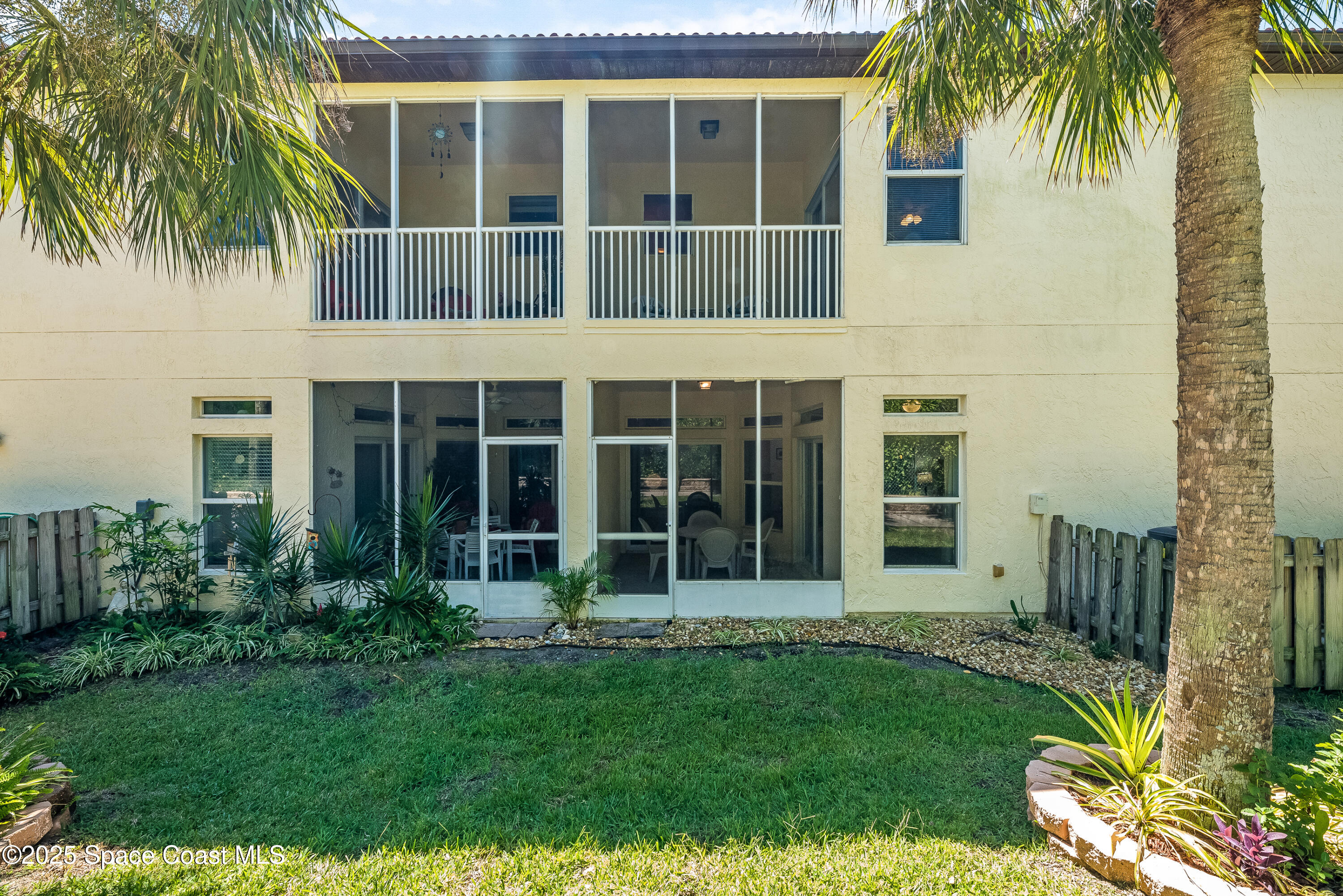 3188 Ricks Way, Unit B Melbourne Beach, FL 32951 - Photo 51 of 58 front view of a house with a yard