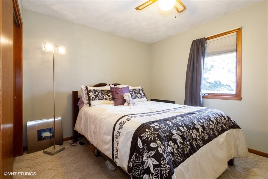 1851 Ipsen Road Belvidere, IL 61008 - Photo 11 of 14 a bedroom with a bed and a window