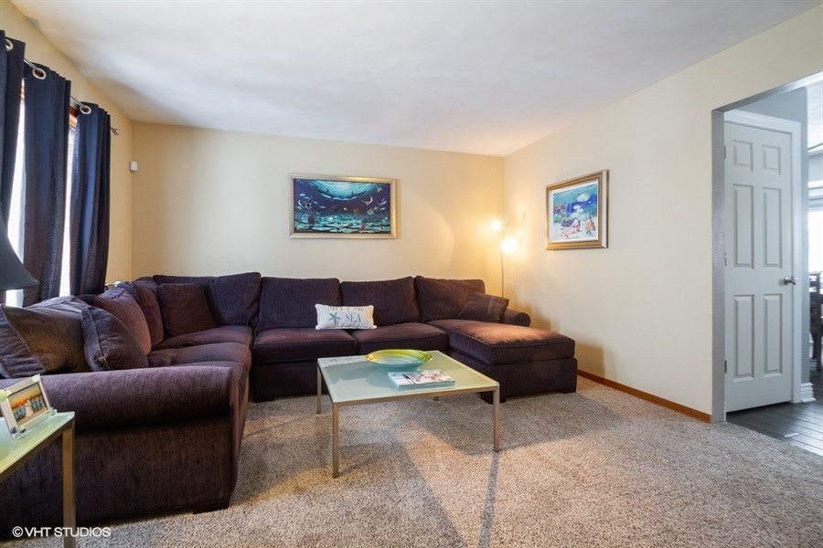 1851 Ipsen Road Belvidere, IL 61008 - Photo 4 of 14 a living room with furniture and a window