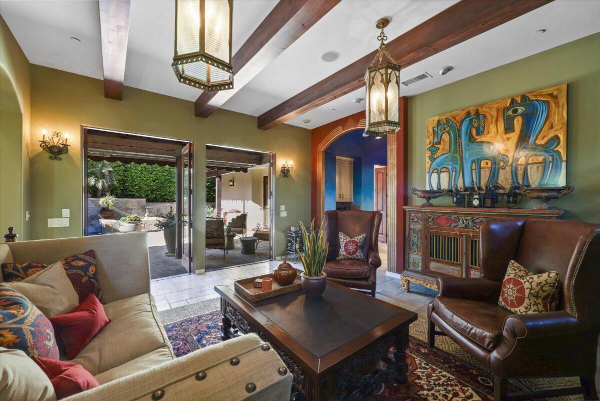 270 West Overlook Road Palm Springs, CA 92264 - Photo 16 of 44 a living room with furniture a rug and a large window