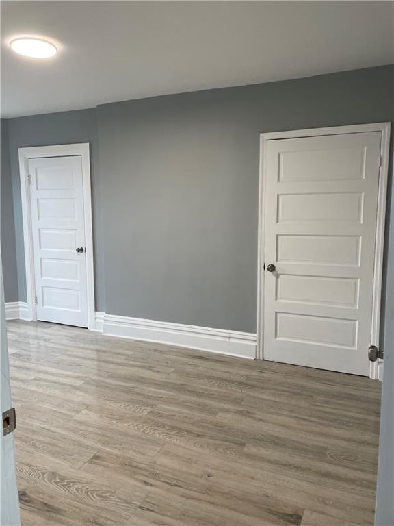 1232 Clairhaven Street Pittsburgh, PA 15205 - Photo 18 of 29 a view of an empty room with wooden floor
