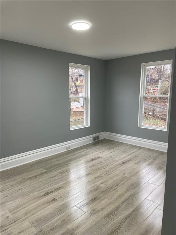 1232 Clairhaven Street Pittsburgh, PA 15205 - Photo 21 of 29 an empty room with wooden floor and windows