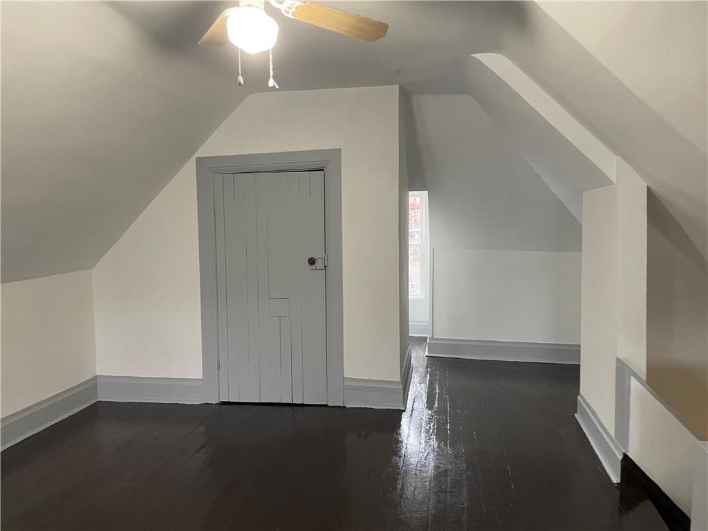 1232 Clairhaven Street Pittsburgh, PA 15205 - Photo 26 of 29 wooden floor in an empty room with a window