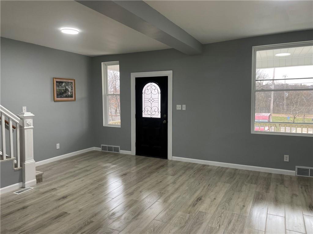 1232 Clairhaven Street Pittsburgh, PA 15205 - Photo 5 of 29 an empty room with wooden floor and windows