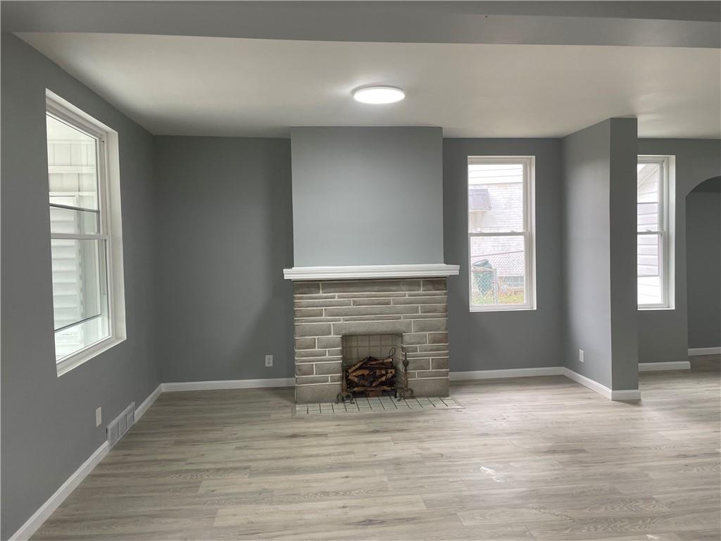 1232 Clairhaven Street Pittsburgh, PA 15205 - Photo 8 of 29 a view of an empty room with wooden floor and a window
