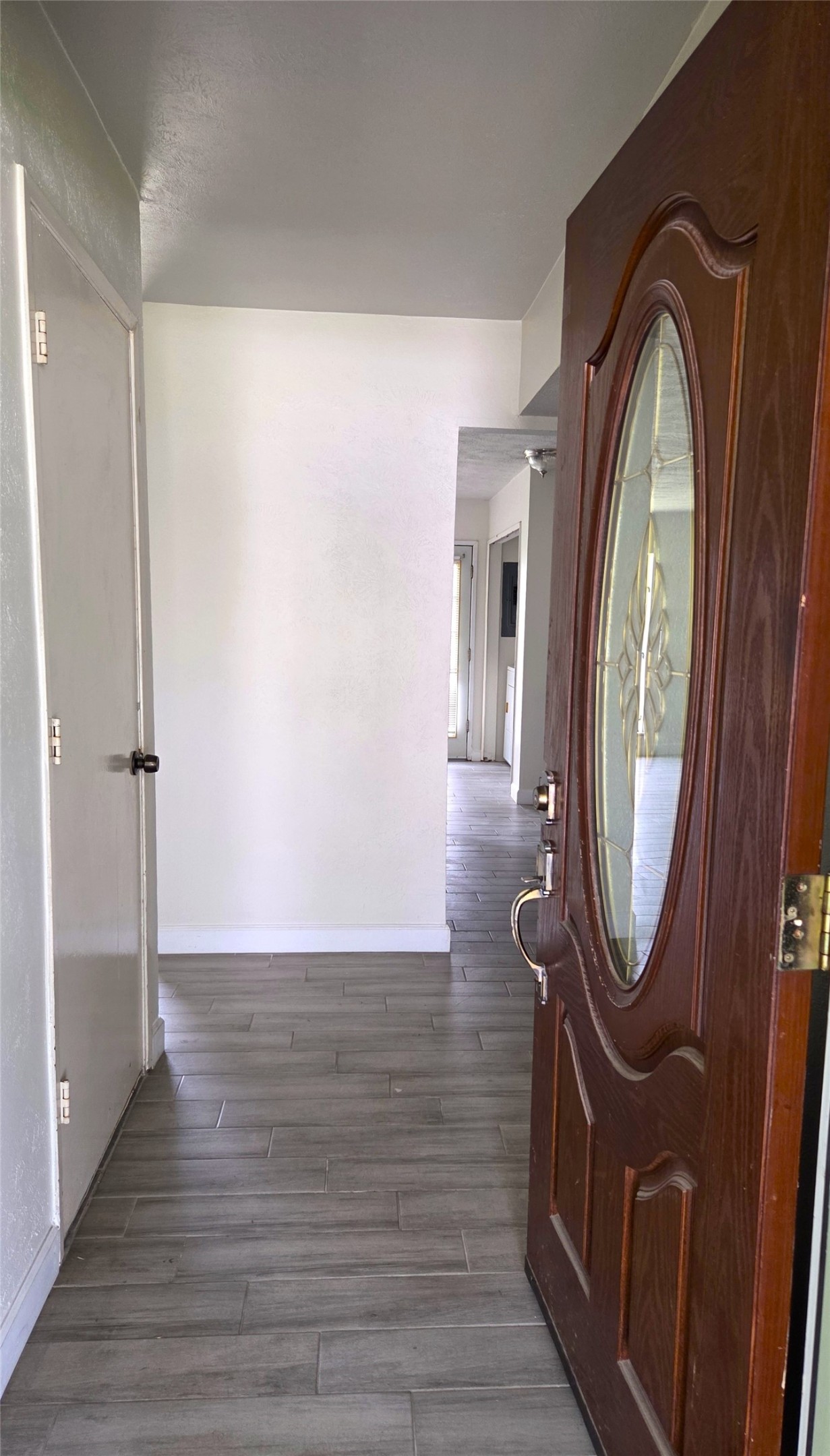 14110 Pinewest Drive Houston, TX 77049 - Photo 5 of 26 a view of a entryway door with wooden floor