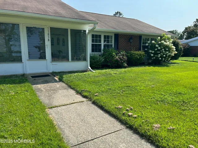 a view of a house with garden