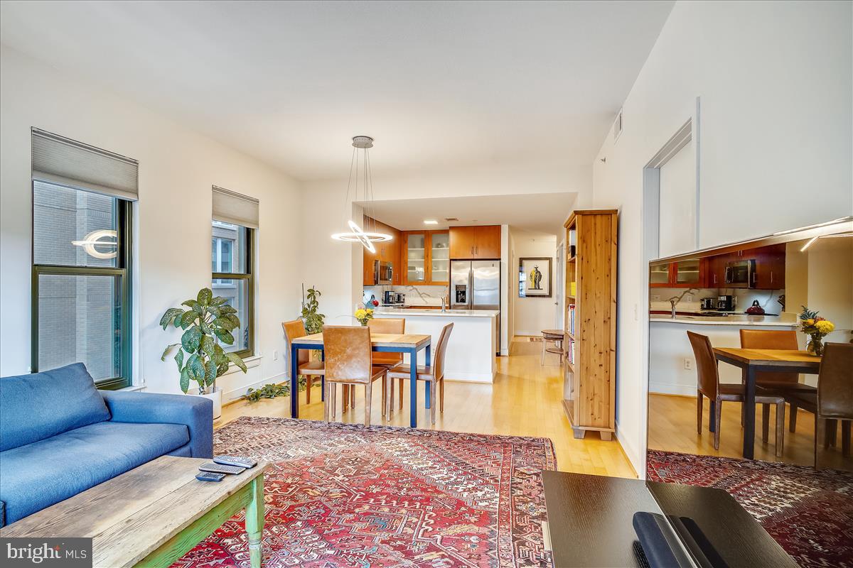 910 M Street Northwest, Unit 403 Washington, DC 20001 - Photo 8 of 36 Living room with dining room and kitchen