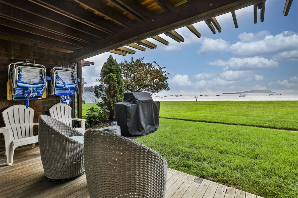 45 Raymond Street, Unit 7 Manchester, MA 01944 - Photo 32 of 40 a view of a porch with furniture