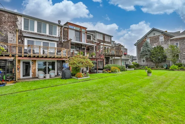 a view of a building with a yard