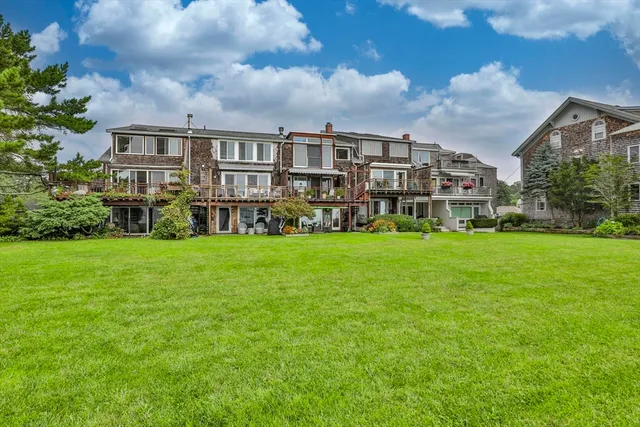 a view of house with yard and front view