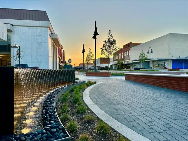 a view of a house with a street