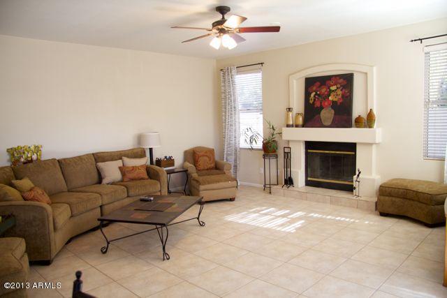 325 West Smoke Tree Road Gilbert, AZ 85233 - Photo 21 of 55 Bright and roomy family room.