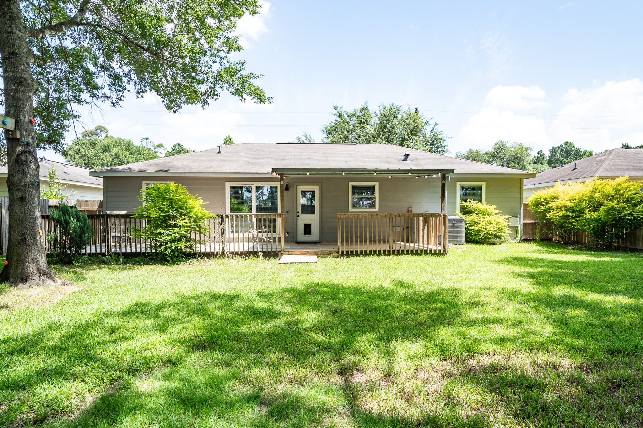 16392 Many Trees Lane Conroe, TX 77302 - Photo 26 of 33 Now for outdoor living...Enjoy your morning coffee on your covered back deck