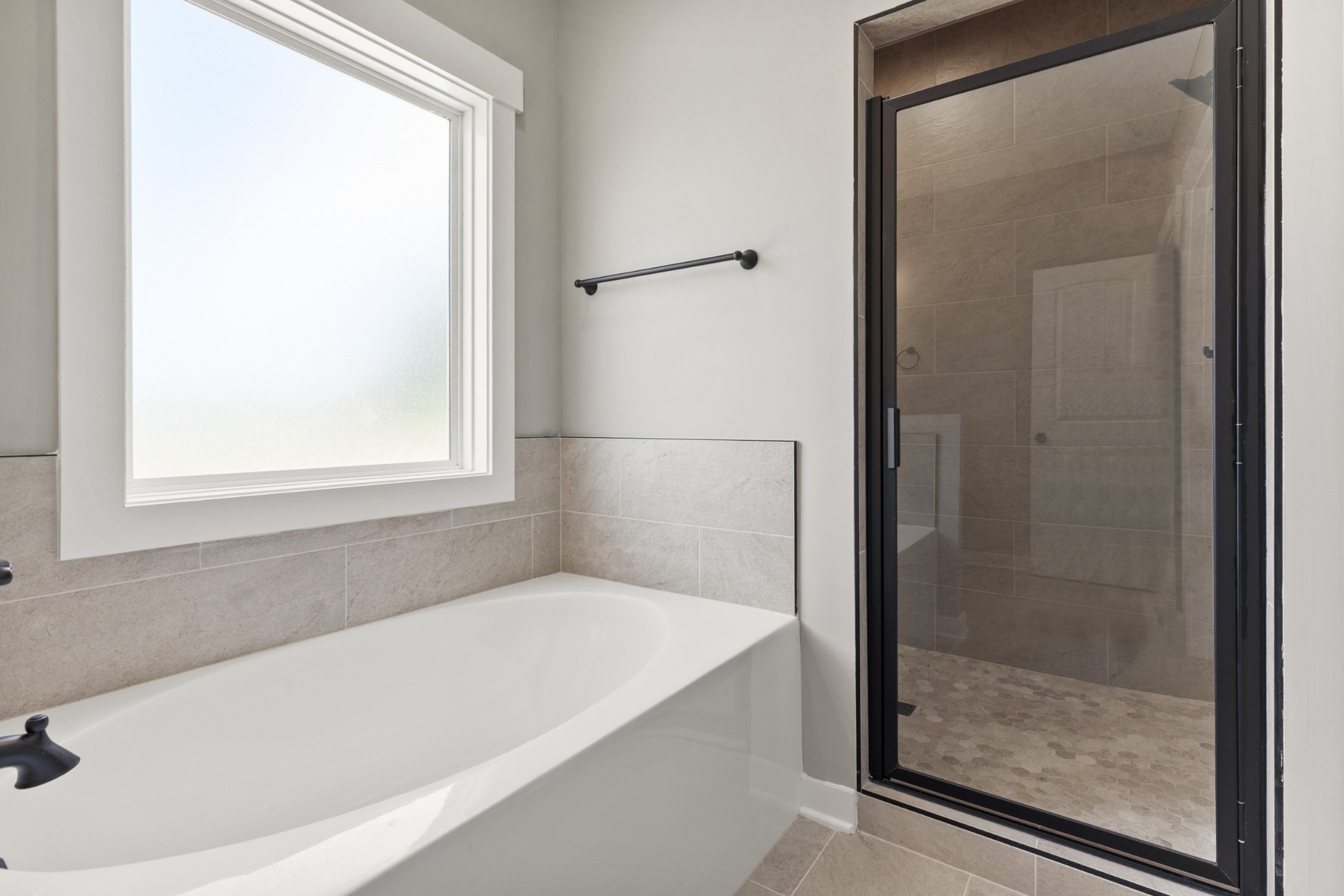 5638 Borthick Road Springfield, TN 37172 - Photo 24 of 43 a bath tub sitting next to a window