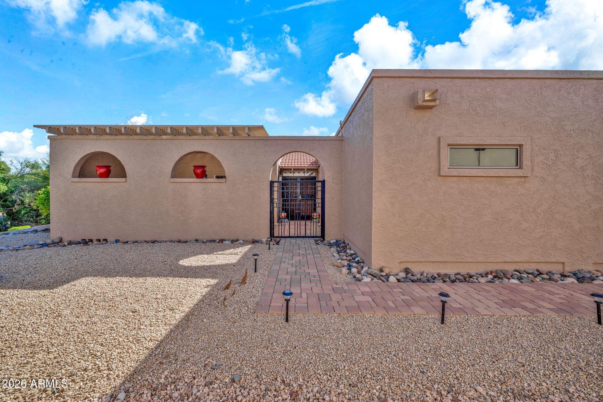 18548 East Parada Circle Rio Verde, AZ 85263 - Photo 3 of 29 Courtyard entrance