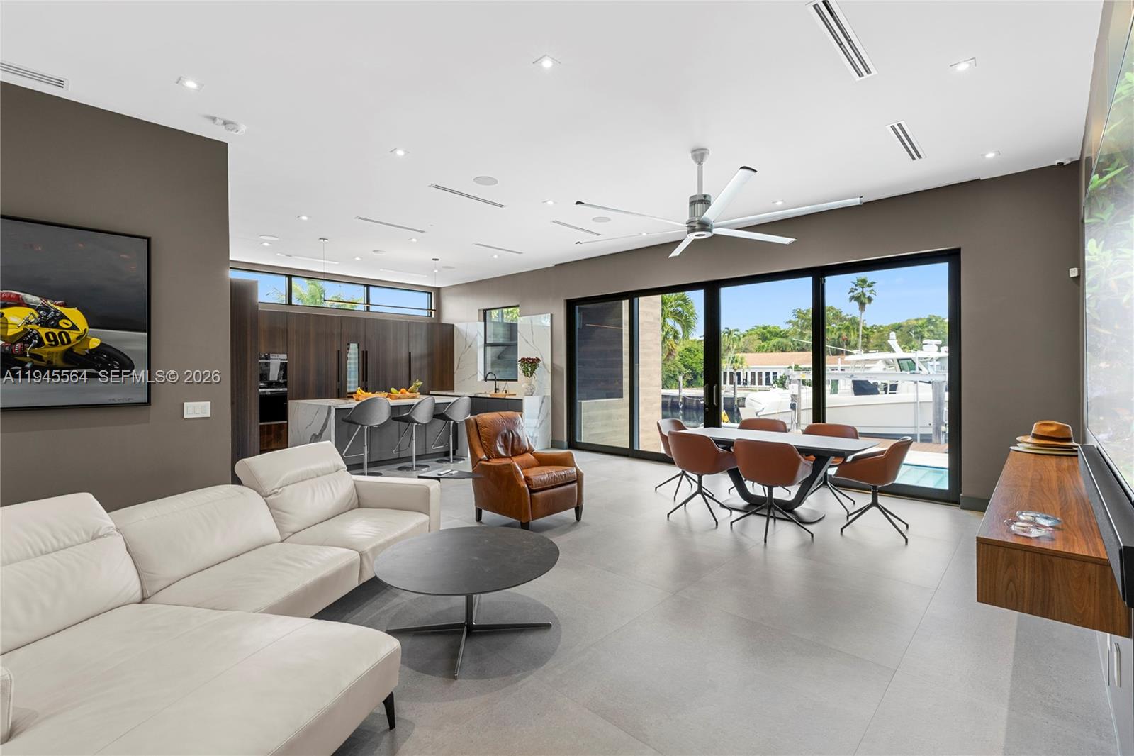 12911 Oleander Road North Miami, FL 33181 - Photo 31 of 67 a living room with furniture and a large window