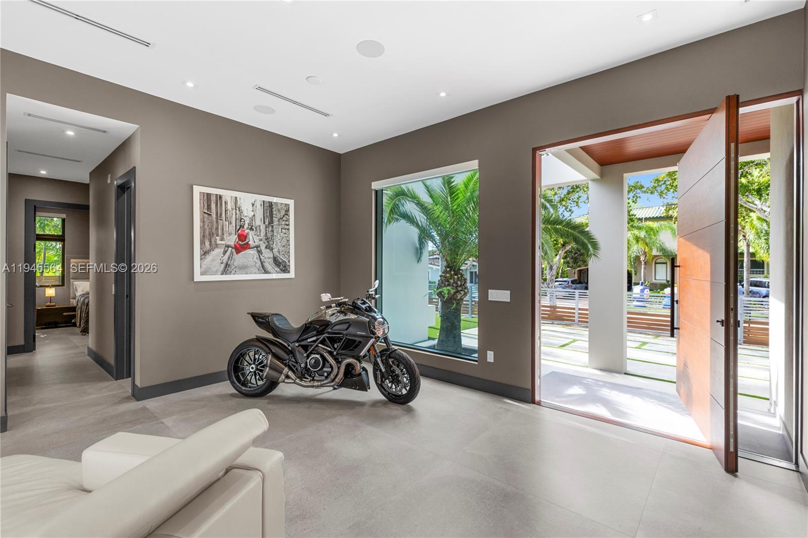 12911 Oleander Road North Miami, FL 33181 - Photo 33 of 67 a view of a livingroom with furniture and floor to ceiling window