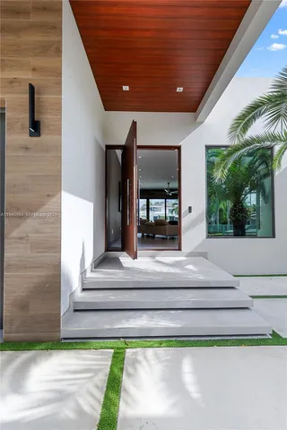 a bedroom with bed and a window