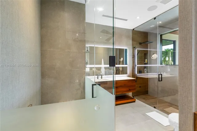 a view of a house with swimming pool and a patio