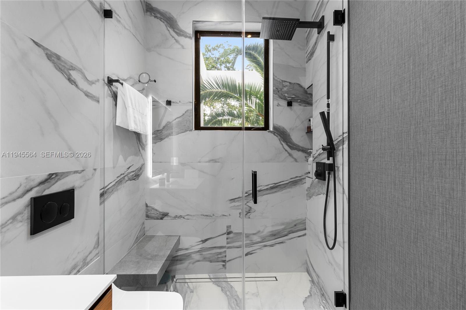 12911 Oleander Road North Miami, FL 33181 - Photo 48 of 67 a bathroom with a tub and a shower