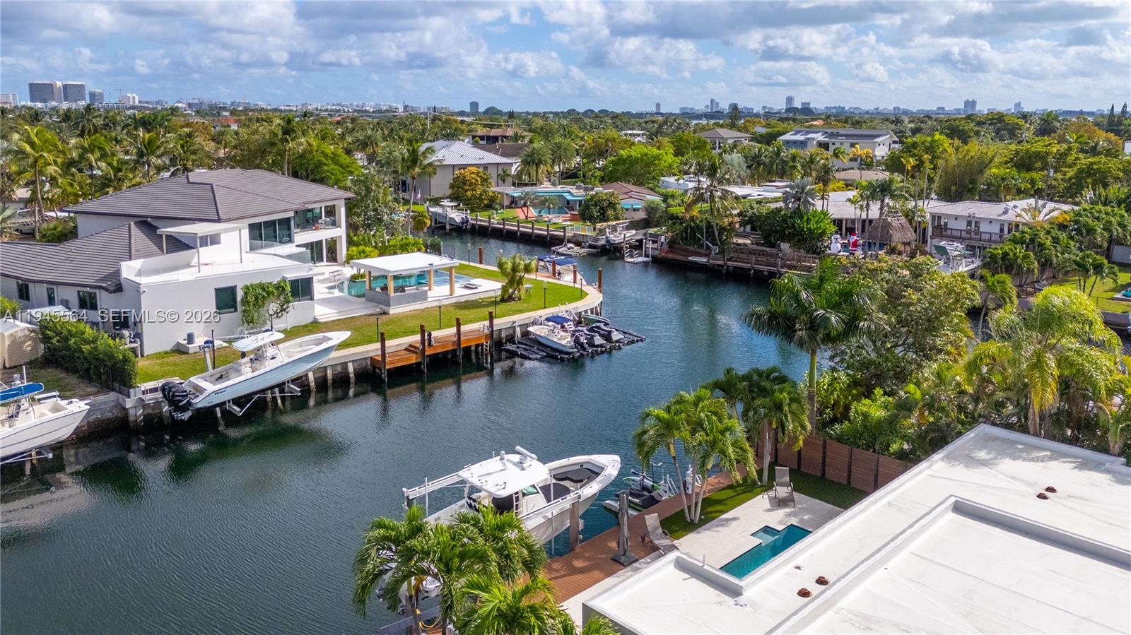 12911 Oleander Road North Miami, FL 33181 - Photo 66 of 67 an aerial view of a house with a lake view
