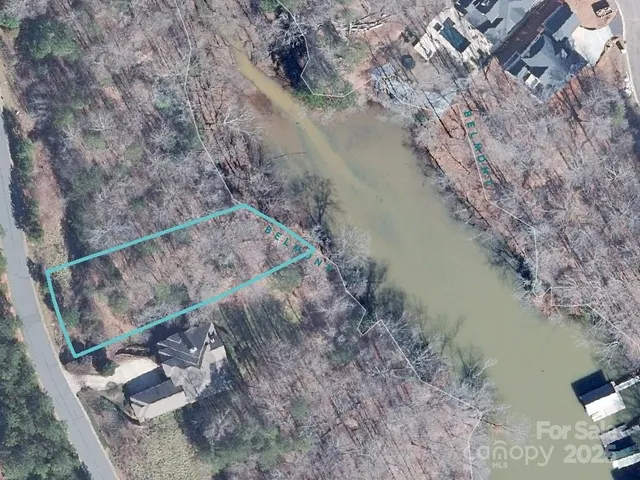 a view of house with ocean view