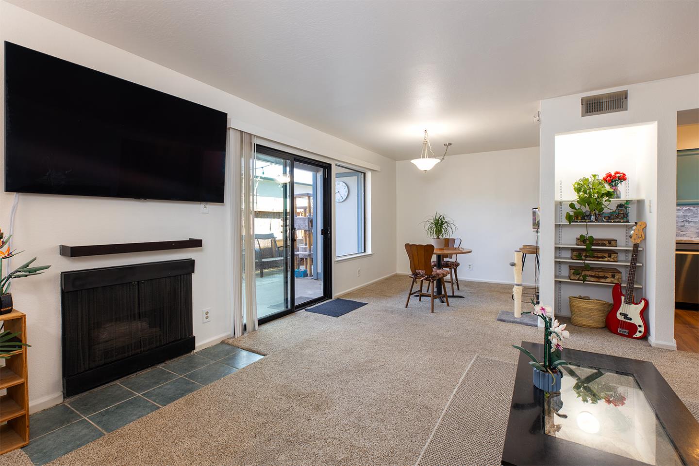 1925 46th Avenue, Unit 121 Capitola, CA 95010 - Photo 6 of 22 a living room with furniture and a fireplace