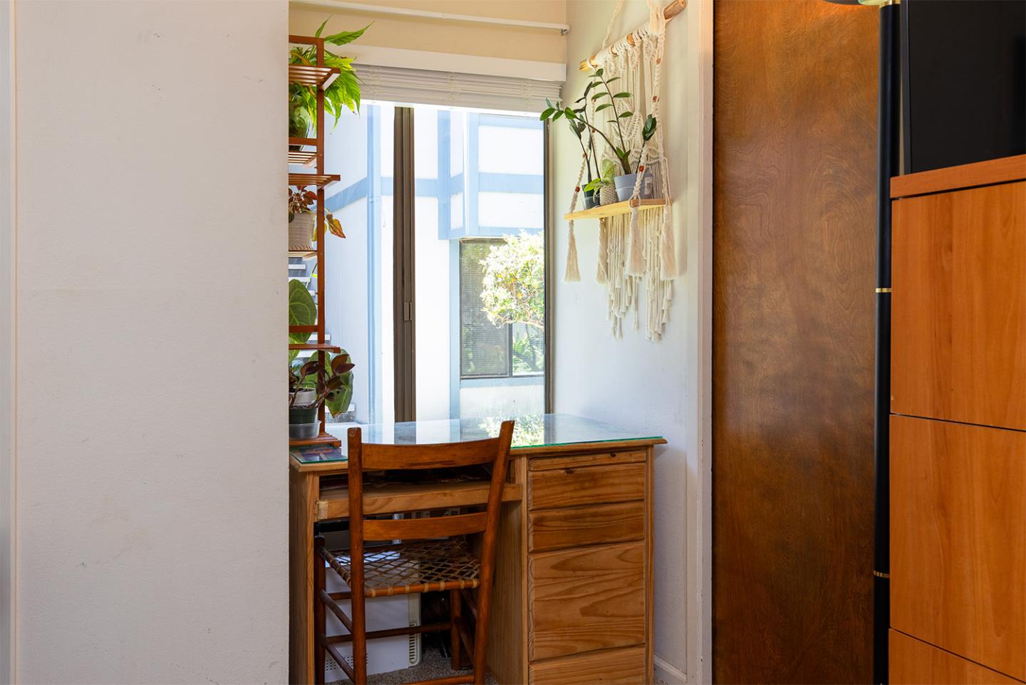 1925 46th Avenue, Unit 121 Capitola, CA 95010 - Photo 10 of 22 a room with a window and a hallway