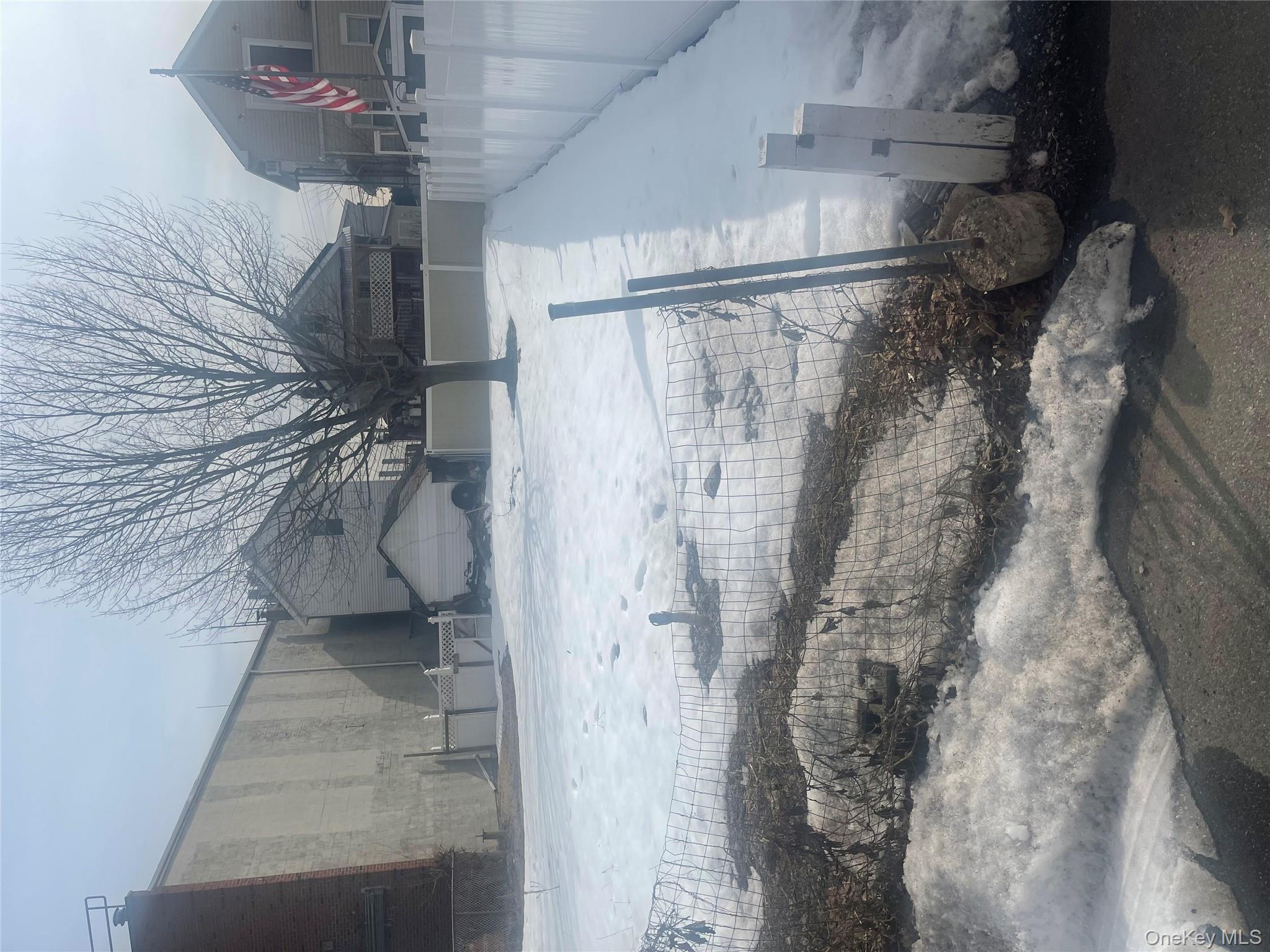 102-32 Rau Court Queens, NY 11414 - Photo 3 of 3 a view of a yard