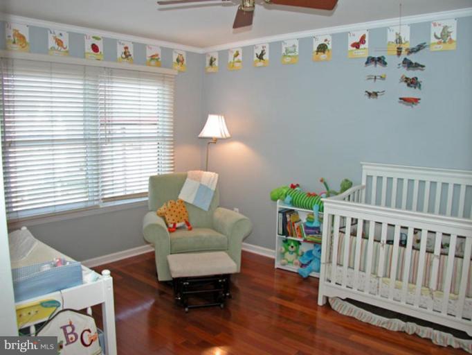 724 West Glebe Road Alexandria, VA 22305 - Photo 12 of 20 a living room with furniture and a window