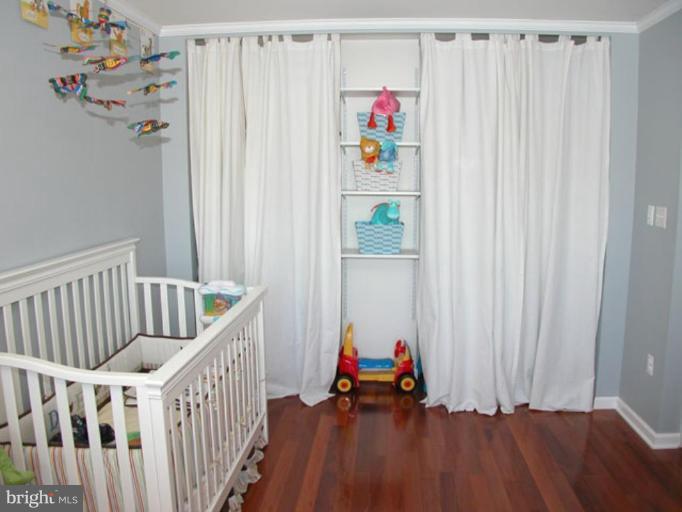 724 West Glebe Road Alexandria, VA 22305 - Photo 13 of 20 a view of kids room with toys and wooden floor