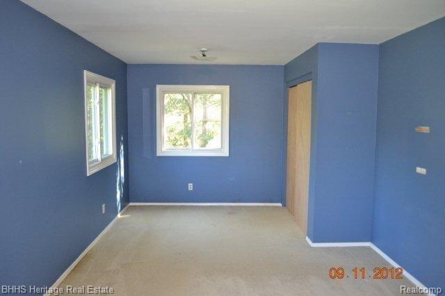 4660 Wylie Road Dexter, MI 48130 - Photo 21 of 25 Master bedroom