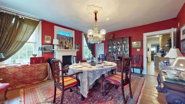 a view of a livingroom with furniture and a table