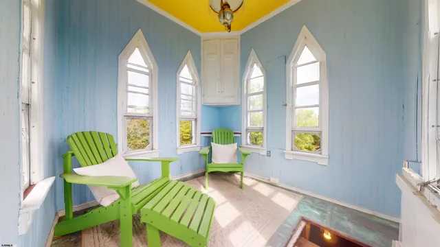 an aerial view of a house with outdoor space and lake view